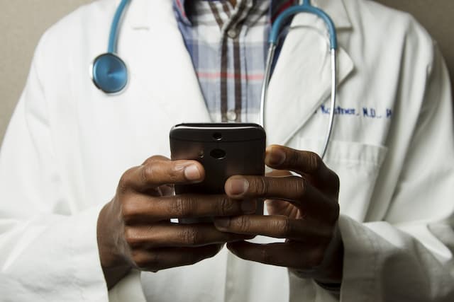Healthcare professional reviewing analytics data