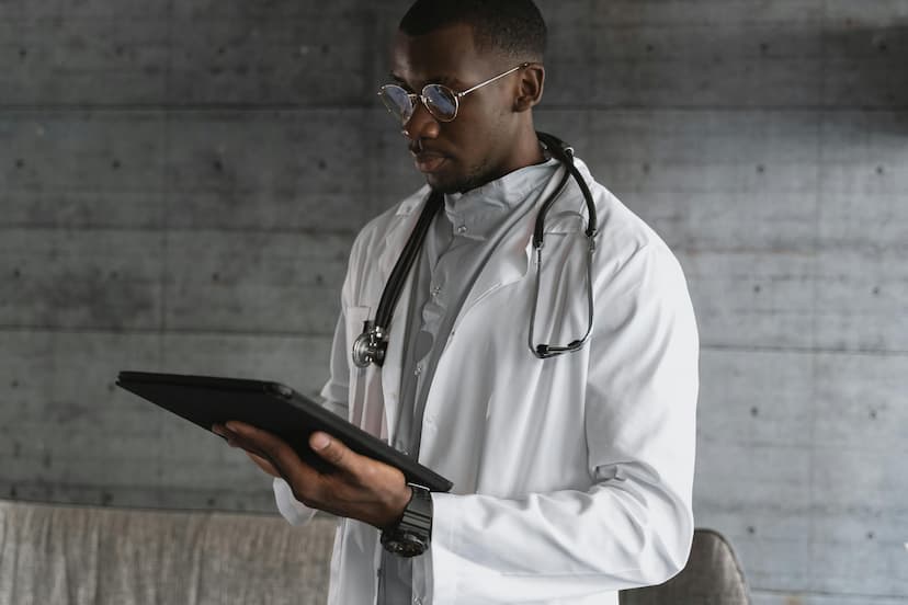 Doctor reviewing digital health data on tablet
